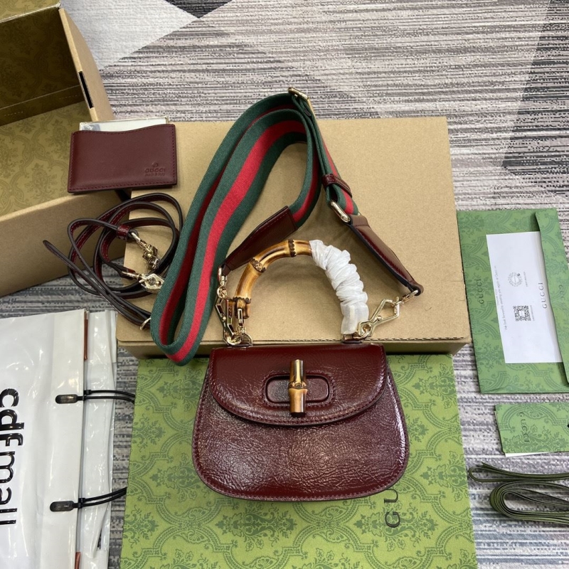G*u*i top handle bags